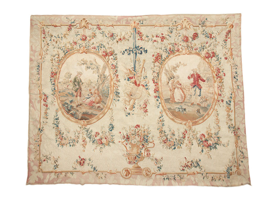 A large tapestry with elegant rococo-scenes