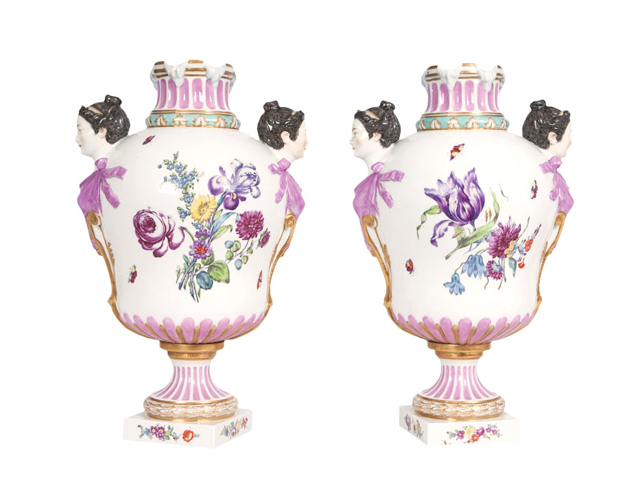 A pair of decorative potpourri vases with mascarons