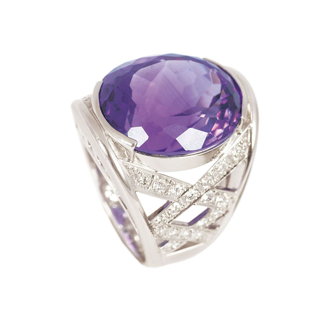 A platinum amethyst ring with diamonds