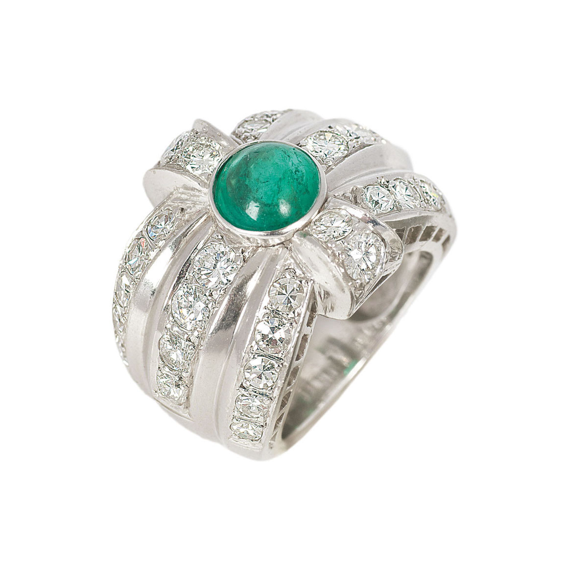 A wide emerald diamond ring