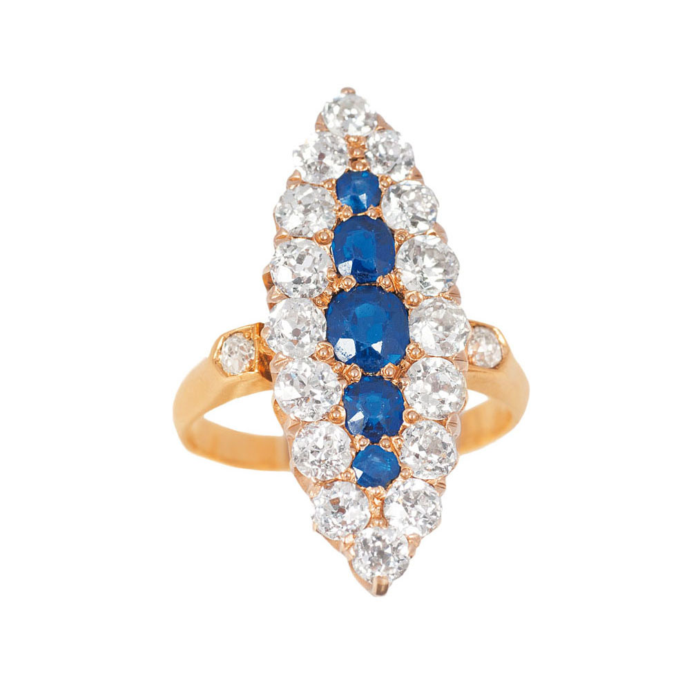 A navette shaped diamond sapphire ring