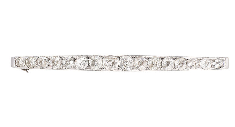 A highcarat Art-Déco diamond brooch