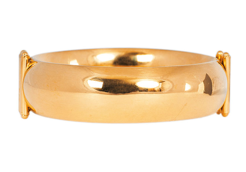 A golden bangle bracelet