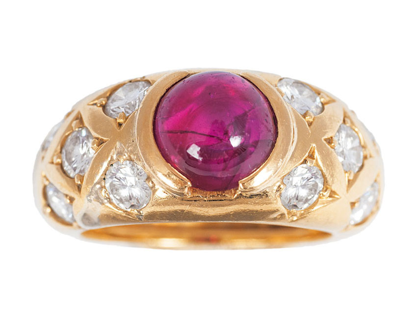 A ring with diamonds and one synthetical ruby