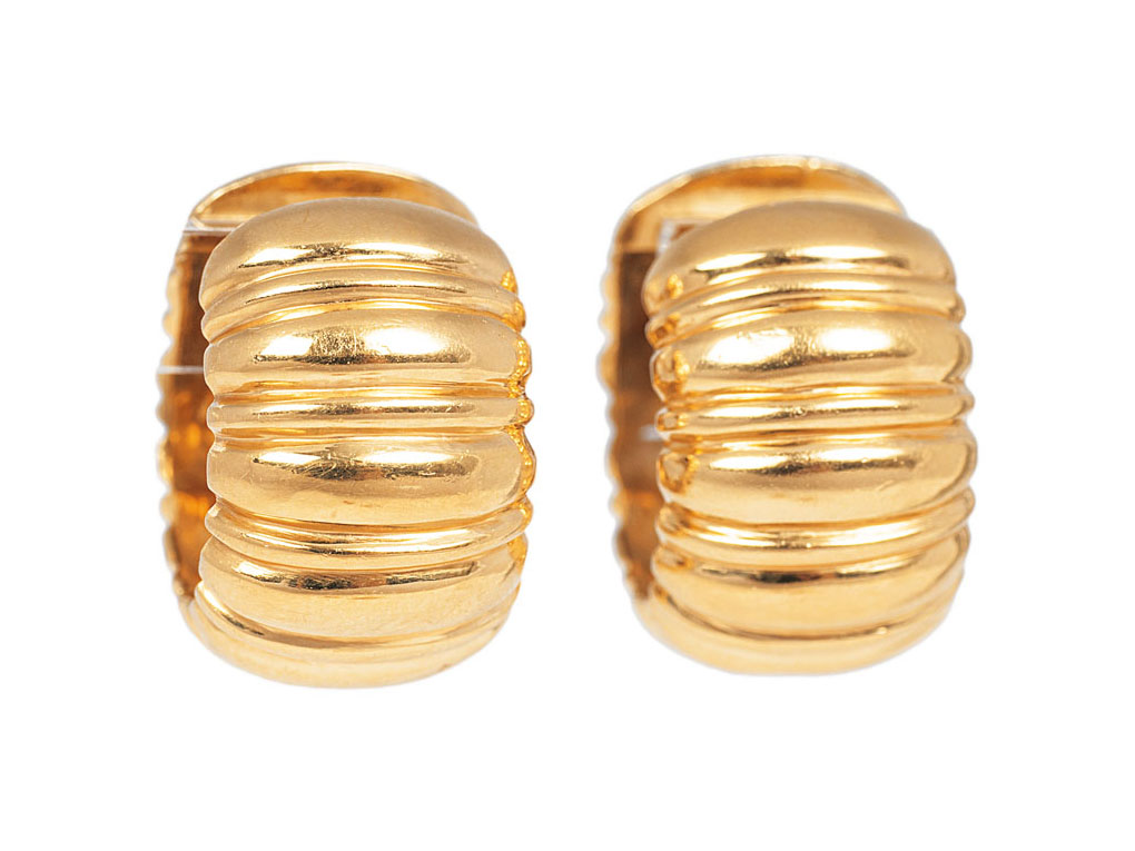 Two pair of golden earrings