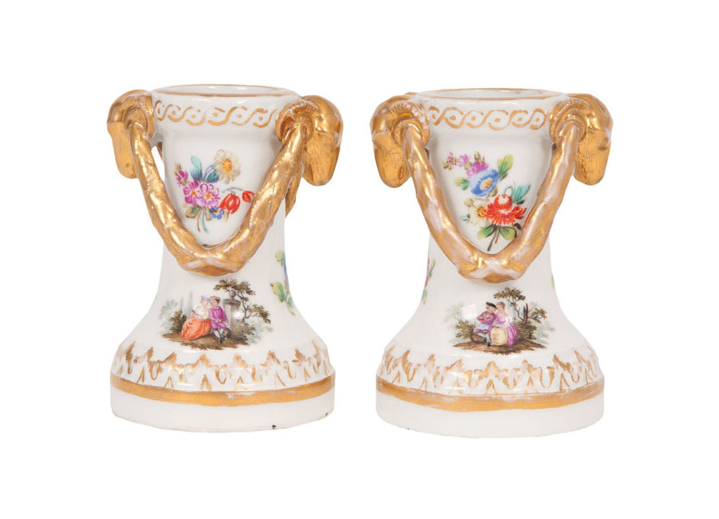 A pair of candleholders with Watteau scenes