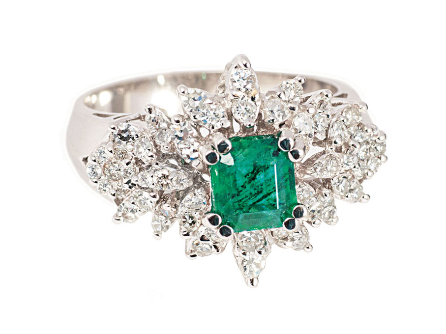 An emerald diamond ring