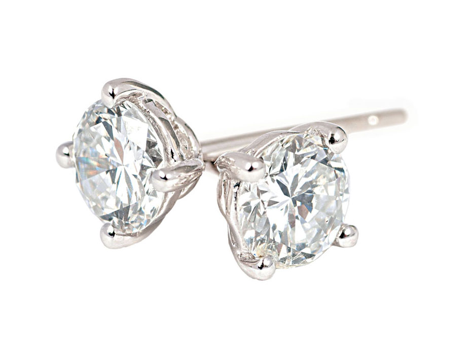 A pair of single stone diamond earstuds