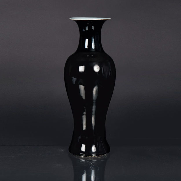 A mirror black baluster vase
