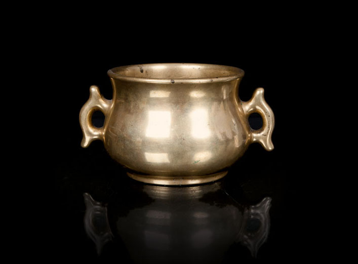 A bronze censer