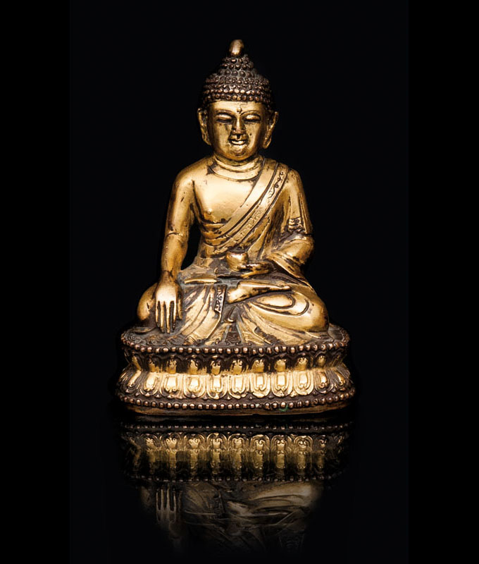 A small bronze Buddha 'Shakyamuni' A small bronze Buddha 'Shakyamuni'