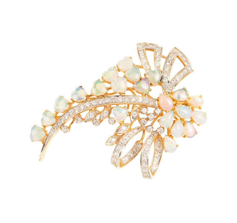 An opal diamond brooch with matching pendant