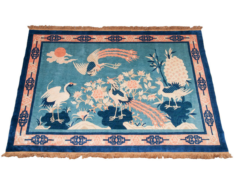 A rug with talismanic birds