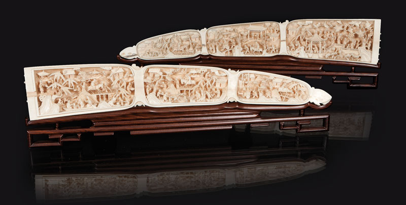 A pair of extremely elaborated ivory-carvings with miniature landscapes