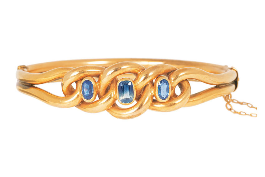 A Victorian golden bangle bracelet with sapphires