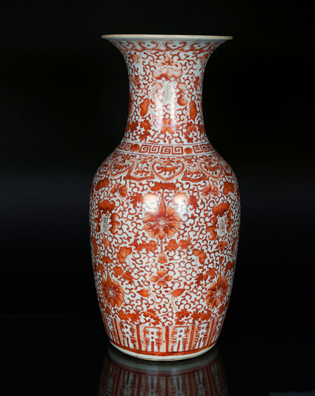 A large iron-red vase with auspicious symbols A large iron-red vase with auspicious symbols