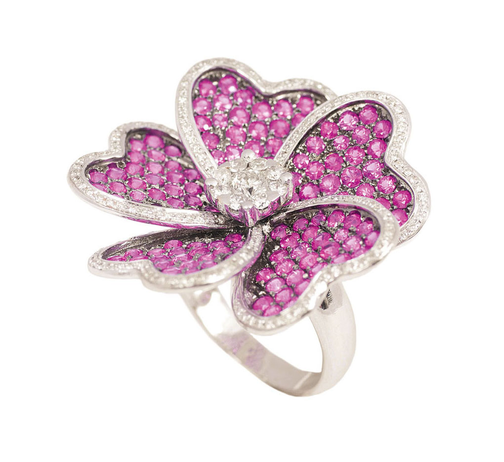 A flowershaped ruby diamond ring