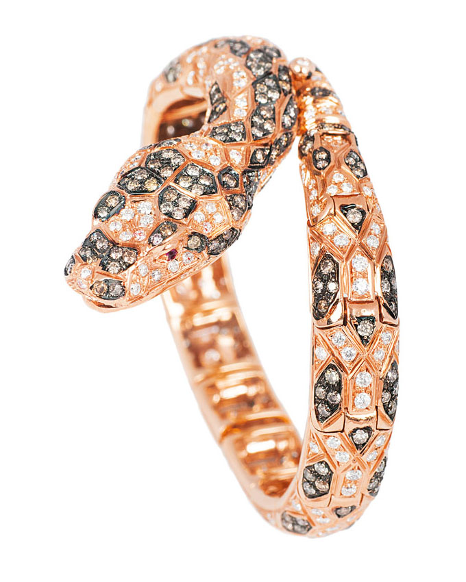 An extraordinary golden bracelet 'Snake' with two-coloured diamonds