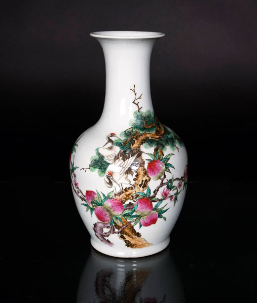 A baluster vase with symbols of longevity