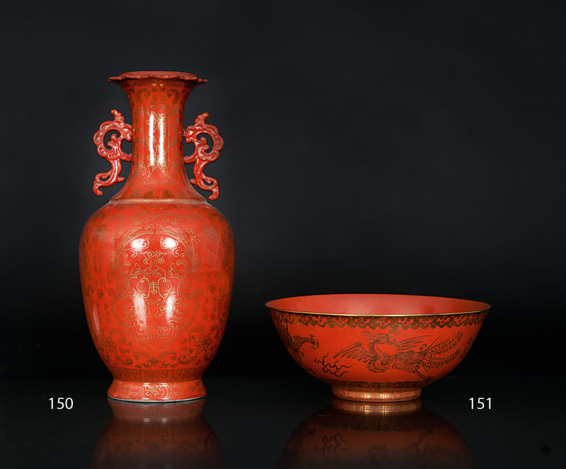 A coral ground vase with auspicious symbols