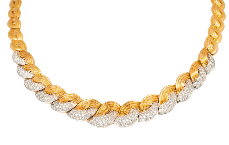 A gold diamond demiparure with necklace and bracelet