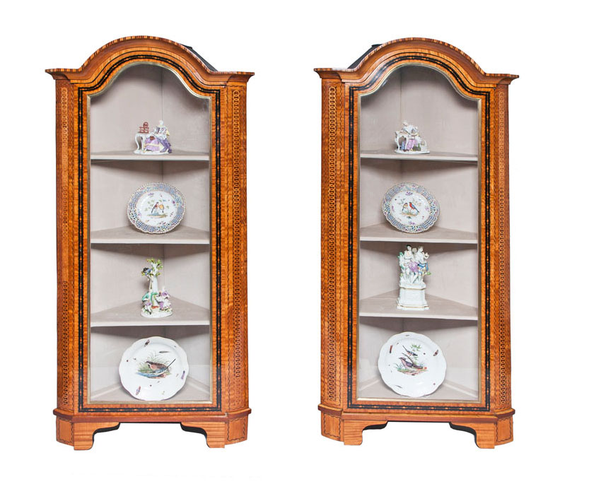 A rare pair of classical corner cabinets