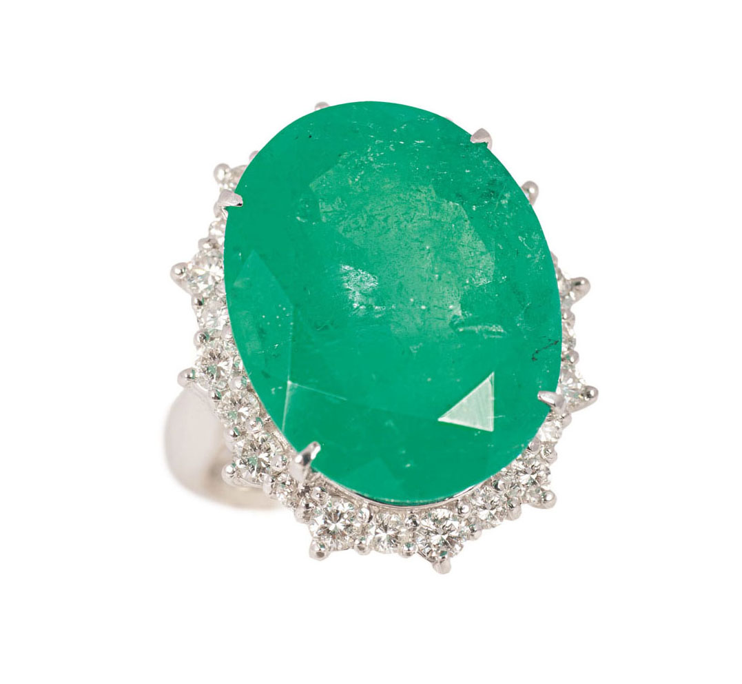 A large emerald diamond ring