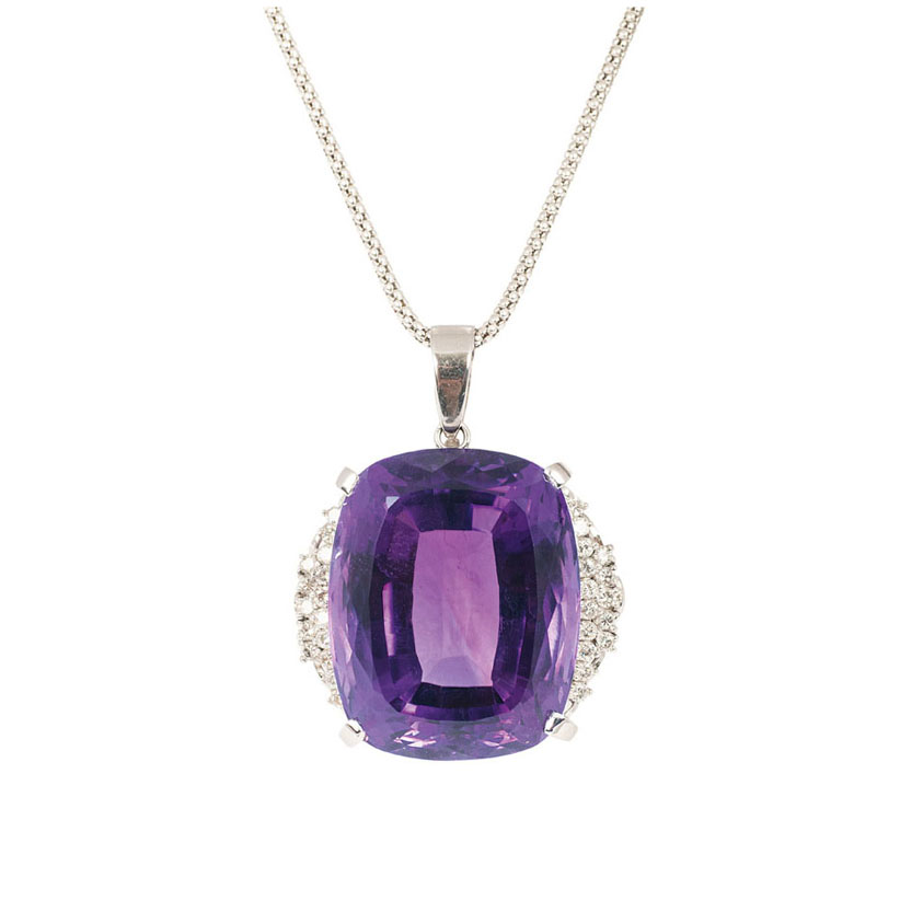 A large amethyst diamond pendant with necklace