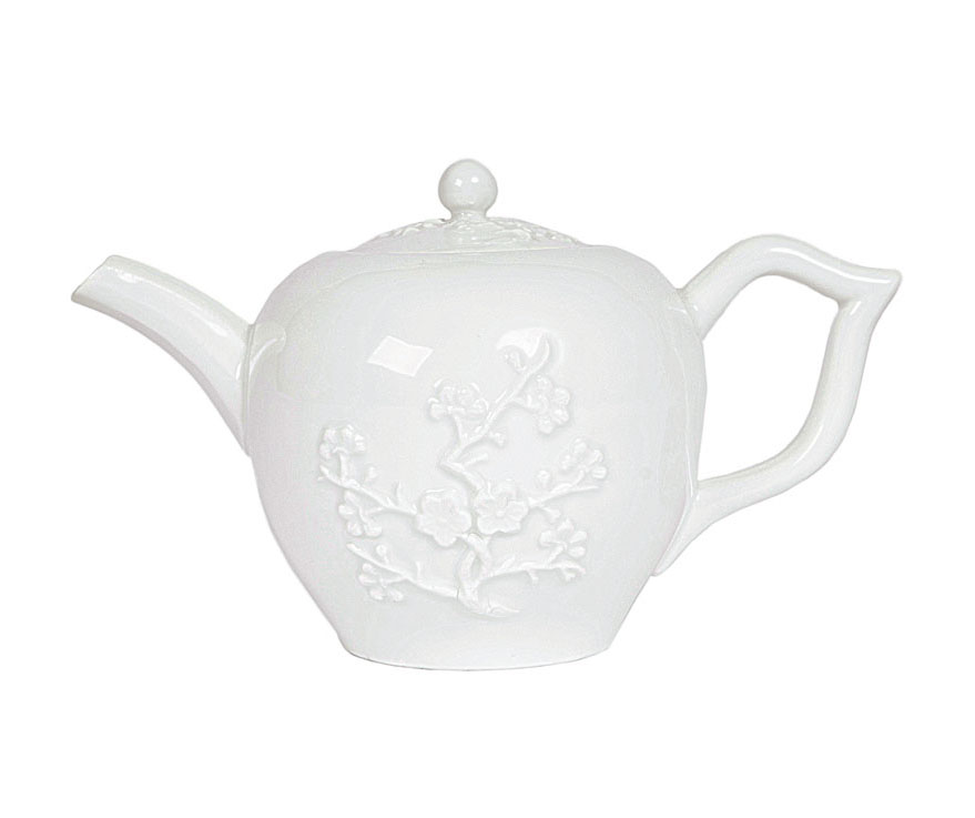 An early tea pot with relief of flowering twigs