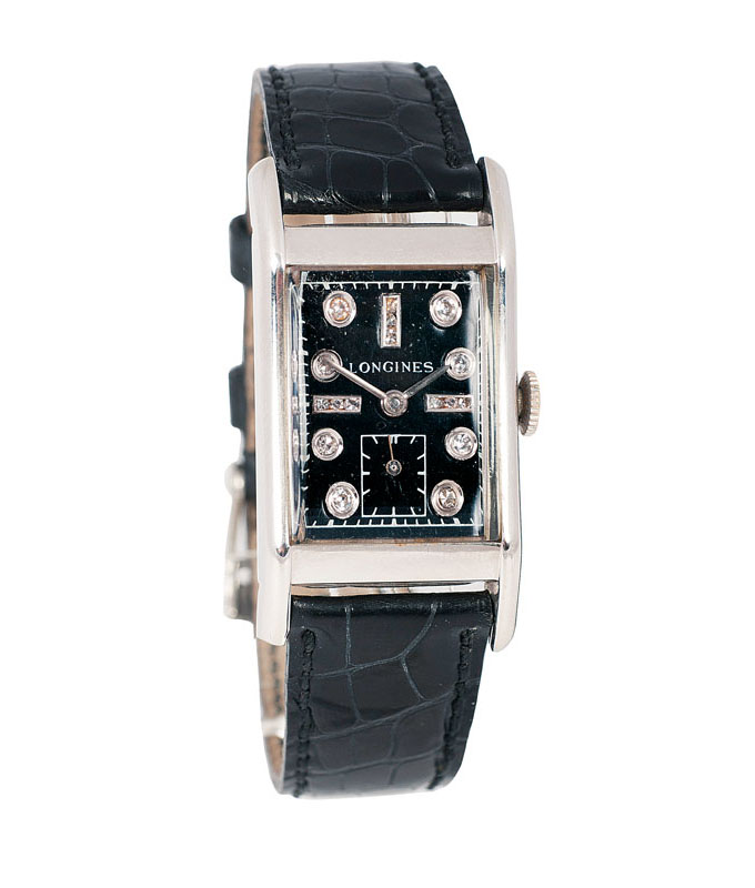 A gentlemen's wrist watch with diamonds by Longines