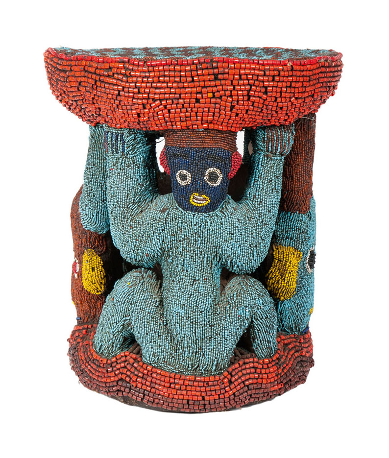 An african stool with beads