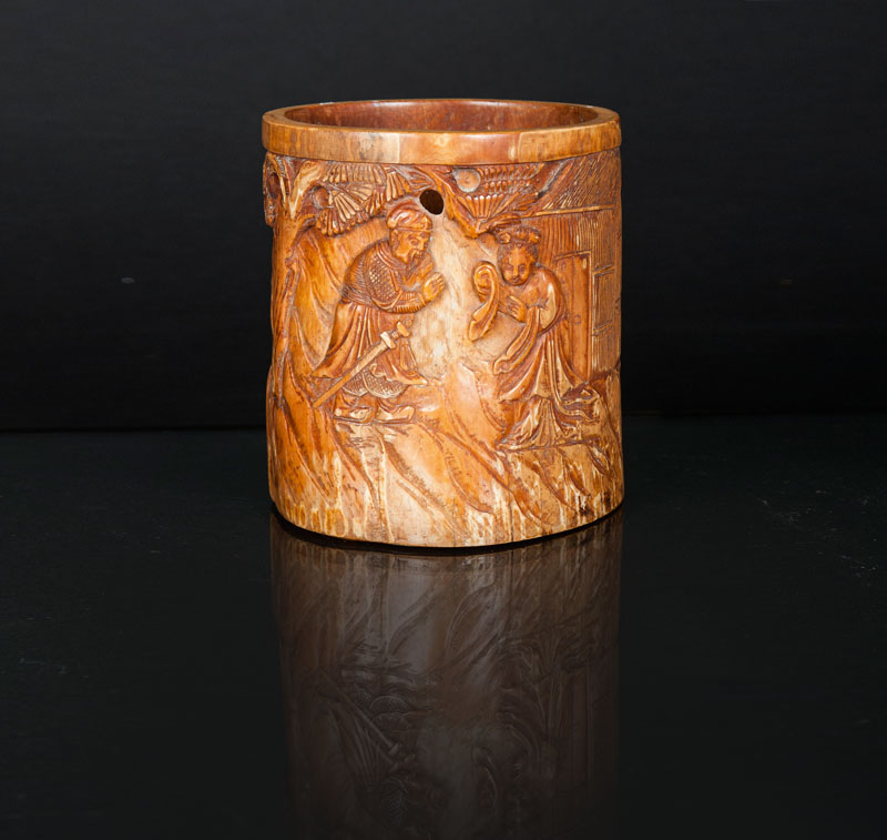 An ivory brush pot with figural scene