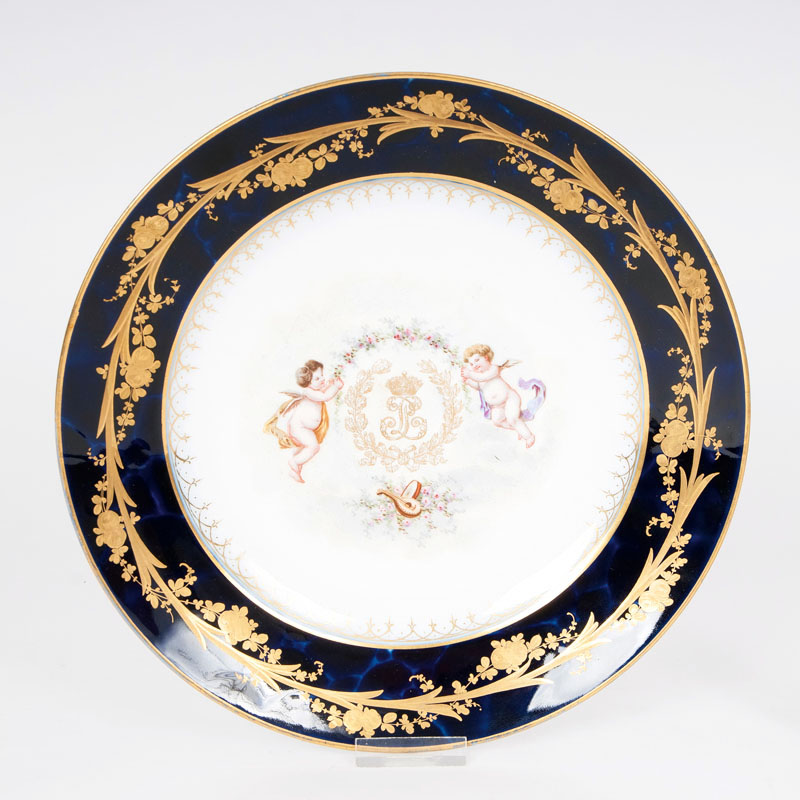 A Sèvres plate decorated with 'Putti'