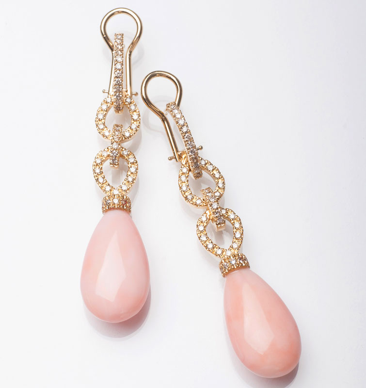 A pair of coral diamond earpendants