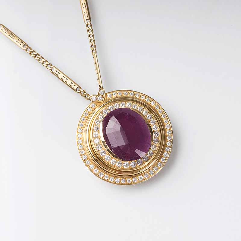 A large ruby diamond pendant with necklace