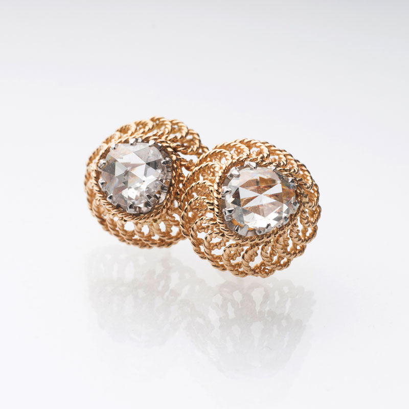 A pair of diamond earrings