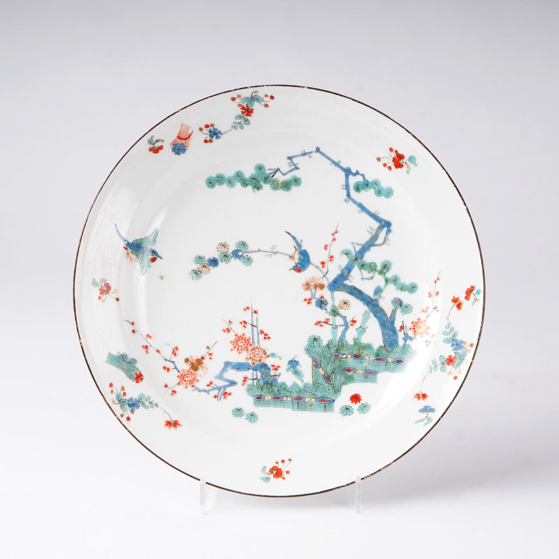 A plate decorated with 'Three friends'