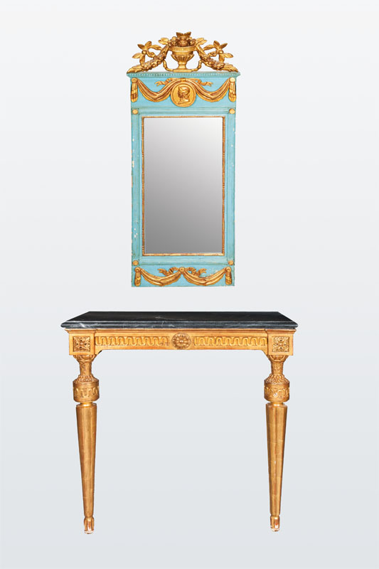 A classizistical mirror with console table