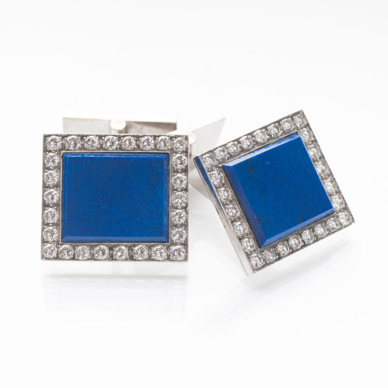 A pair of cufflinks with diamonds and lapis lazuli