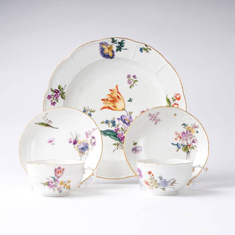 A set of Meissen service pieces with flower painting