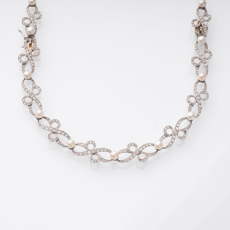 An Art-Nouveau natural pearl diamond necklace