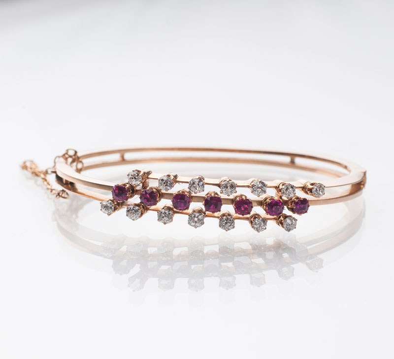 - An Art-Nouveau golden bangle bracelet with old cut diamonds and rubies An Art-Nouveau golden bangle bracelet with old cut diamonds and rubies