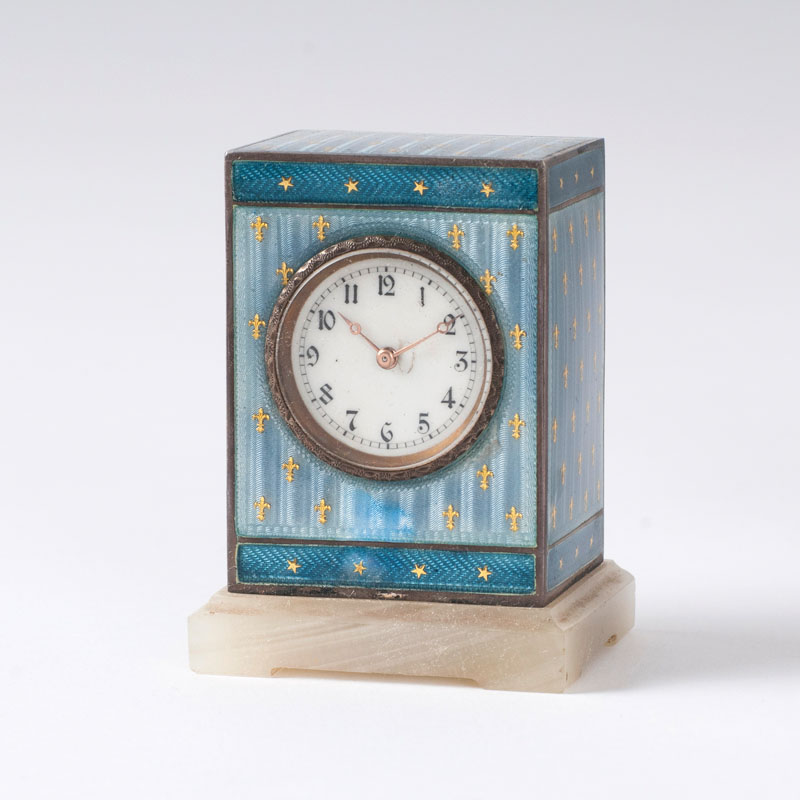 A small enamel carriage clock with box
