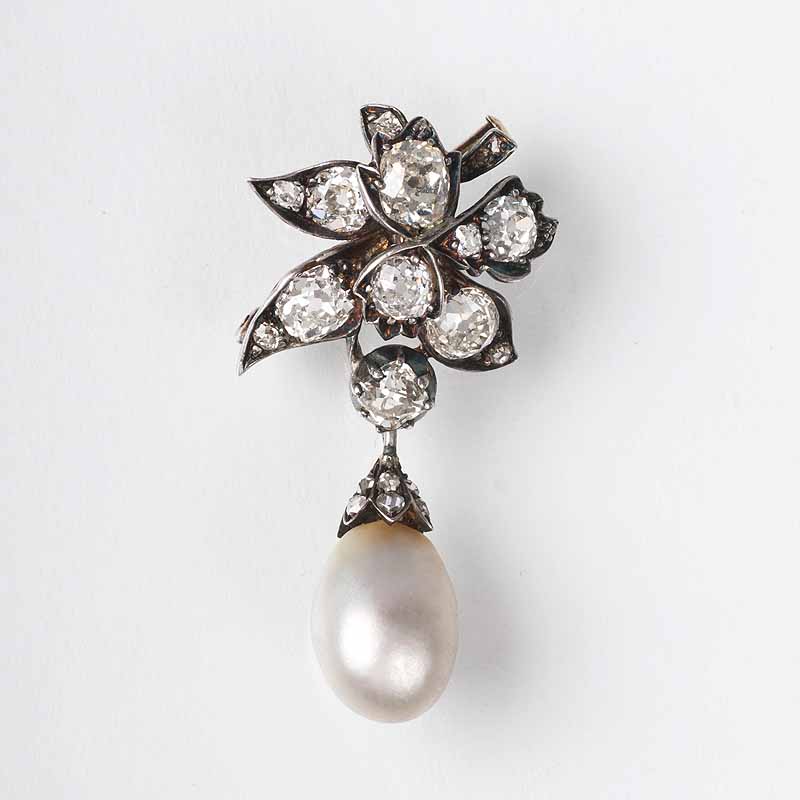 A Victorian diamond brooch with natural pearl