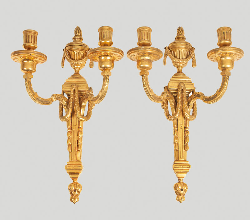 A pair of firegilded Louis Seize wall appliques