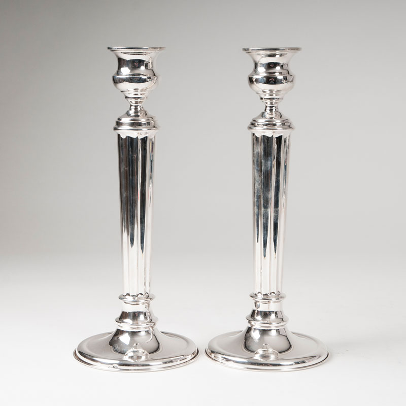 A pair of high candlesticks