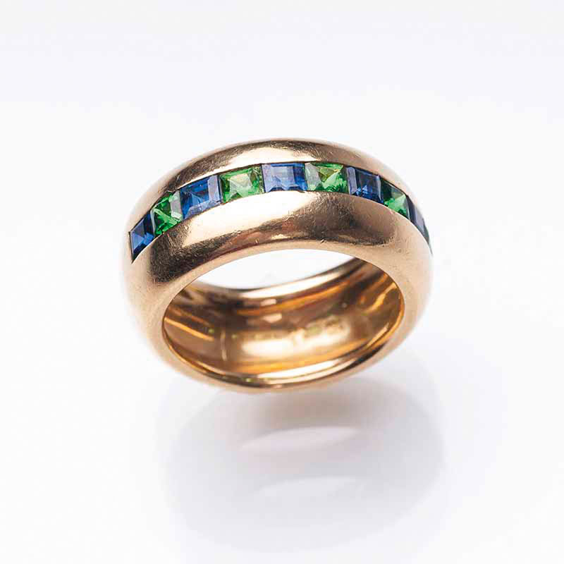 A ring with sapphires and tsavoriths by Jeweller Hansen