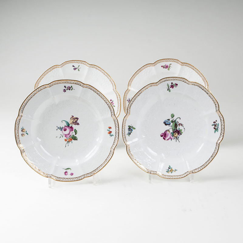 A set of 4 curved plates with "Gotzkowsky relief"