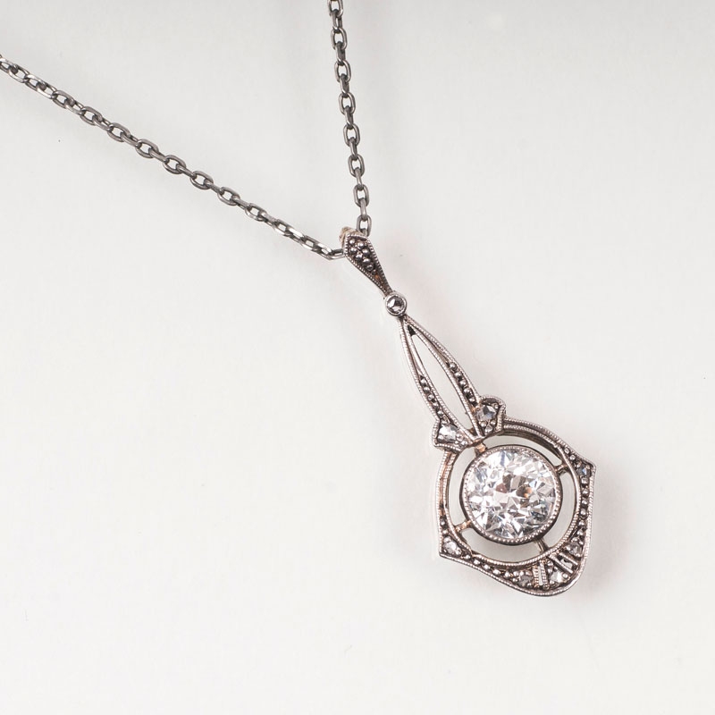 An old cut diamond pendant with necklace
