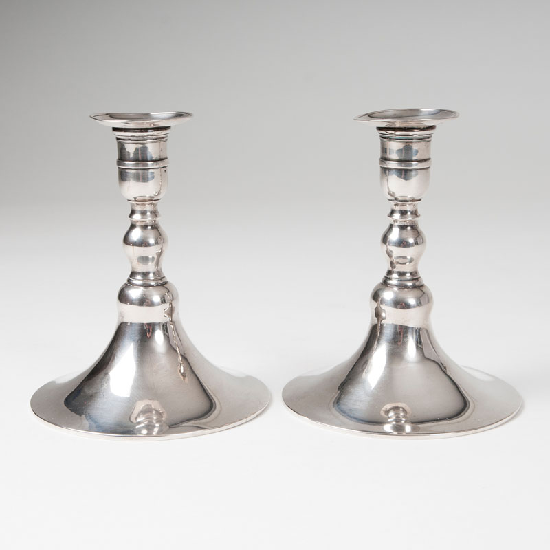 A pair of Baroque candlesticks